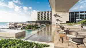 Grand Hyatt Playa del Carmen bedroom, modern design, ideal for events and retreats.