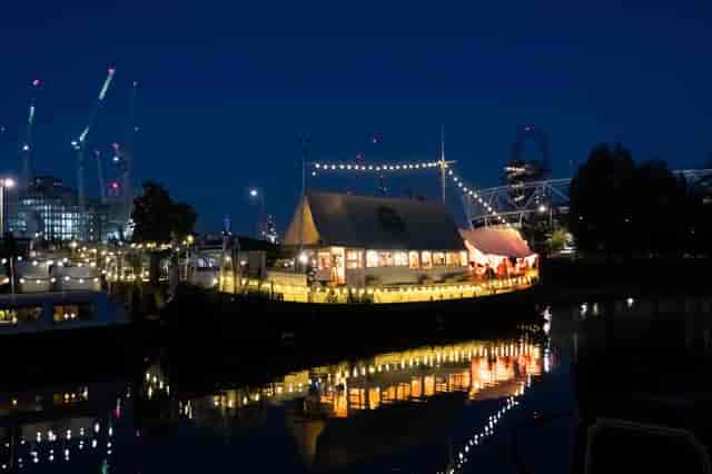 Barge East garden waterfront venue with festoon lighting for corporate events and brand activations.