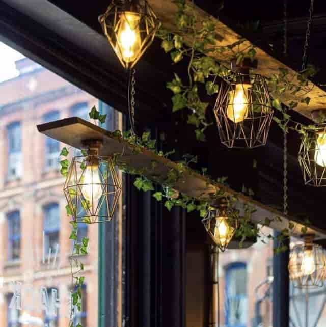 Stylish Main Bar with geometric pendant lights for events at The Shack NQ.