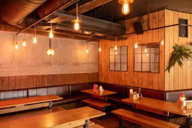 Cozy modern venue with wooden accents for networking events in Birmingham.