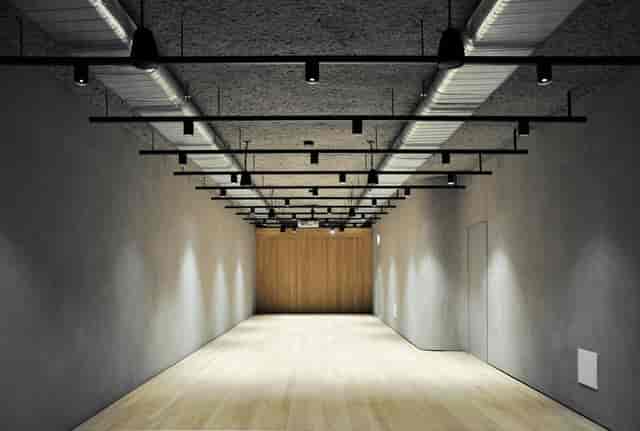 Versatile No.9 Cork Street event space with sleek lighting for workshops and presentations.