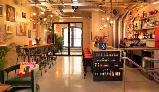 Vibrant event space at The Little Scarlet Door, perfect for meetings and networking.