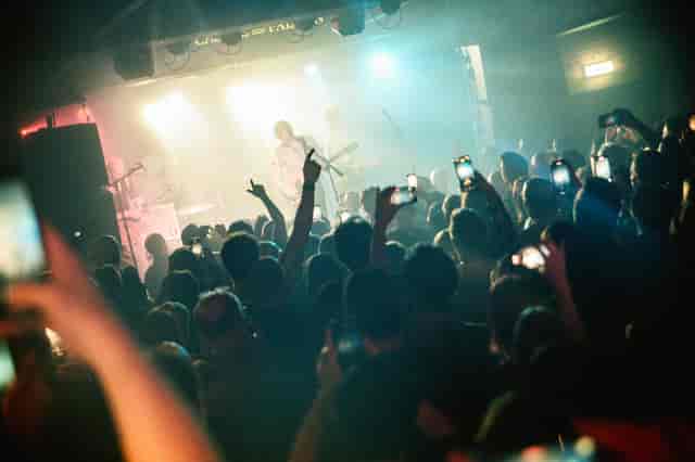 Vibrant live music event at Castle & Falcon with engaged audience and dynamic lighting.