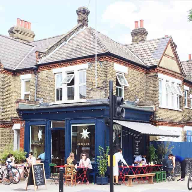 Vibrant Crol and Co café in Bermondsey with outdoor seating for casual meetings.
