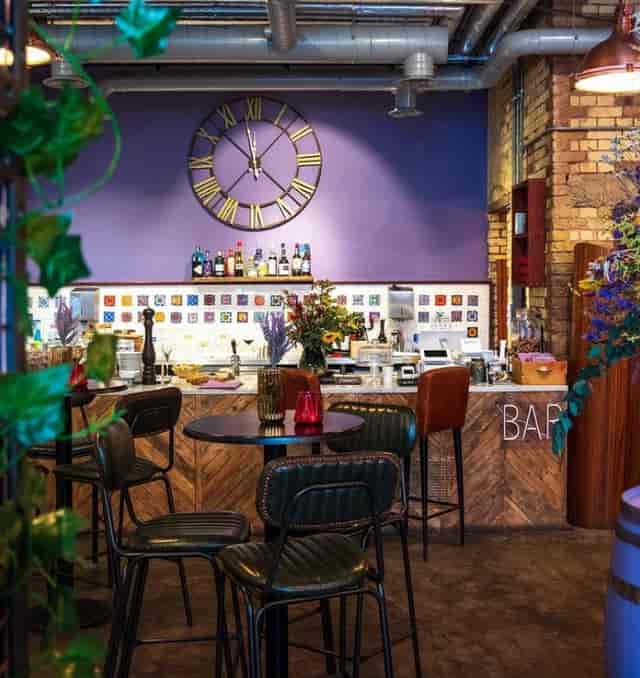 Stylish bar at Cecilia's Wine House, ideal for networking events and casual meetings.