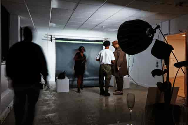 Photography studio event setup with backdrop and lighting for memorable moments.