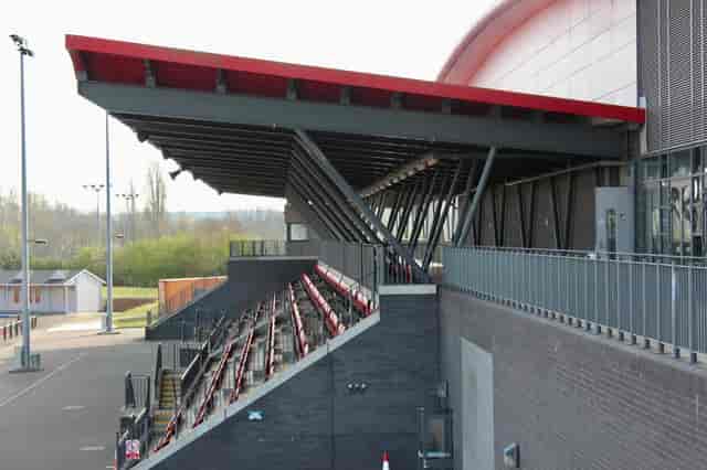 Athletics Track in Basildon: modern venue with tiered seating for events and gatherings.