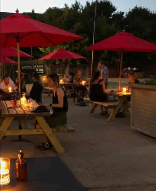 Outdoor dining setup at Renegade Urban Winery for casual networking events.