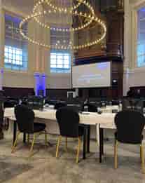 Koepelzaal meeting space in Renaissance Amsterdam, set up for professional presentations.