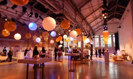 Vibrant event space with colorful balloons, perfect for networking or celebrations.