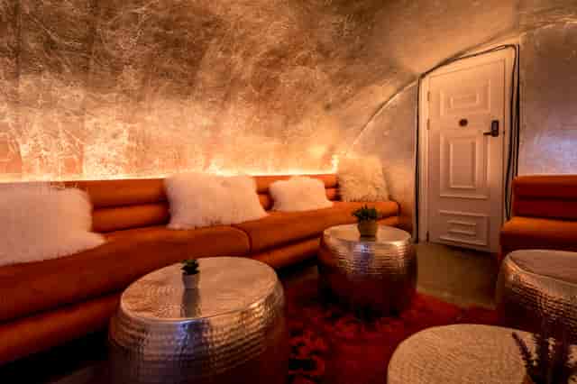 Intimate lounge at The Vault, featuring plush seating for networking events.