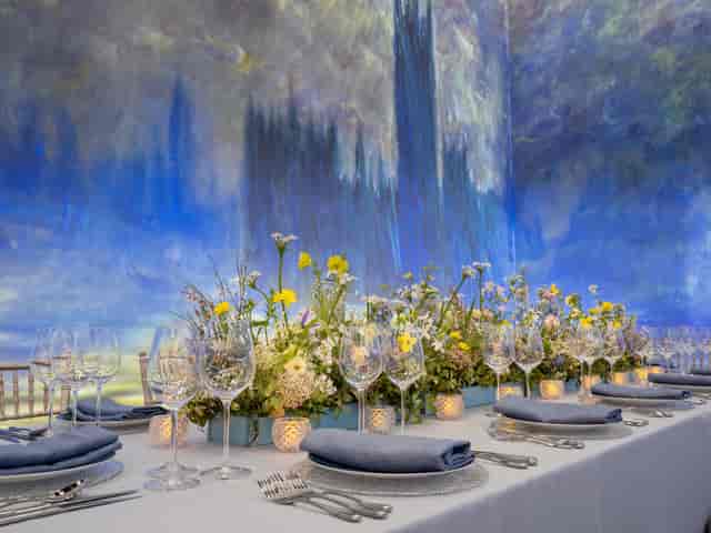 Elegant dining table with floral arrangements for upscale events and intimate gatherings.
