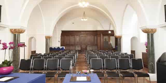 Chapel Suite historic venue with vaulted ceilings for intimate presentations and academic meetings.