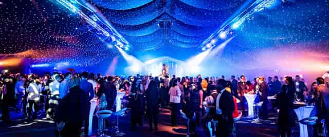 Vibrant event space at The Marquee, elegant draping, perfect for networking and entertainment.