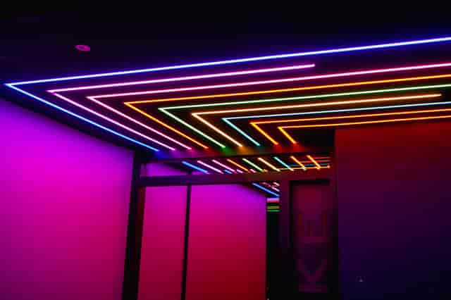Private karaoke room with neon lighting, perfect for creative events and parties.