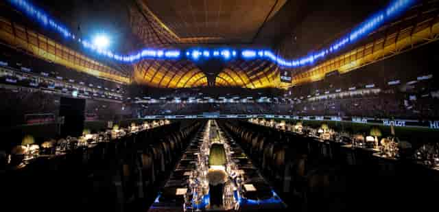 Gala stadium event, exclusive hire, dramatic lighting