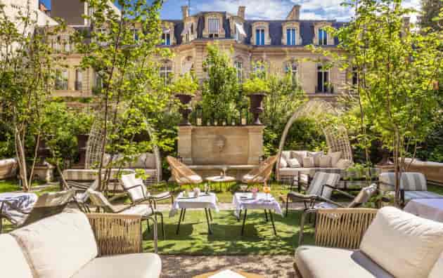 Private room at Apicius restaurant with elegant seating for upscale events and receptions.
