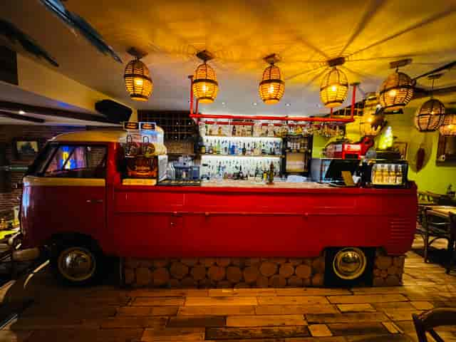 VW bar area with red truck, perfect for casual events and networking functions.