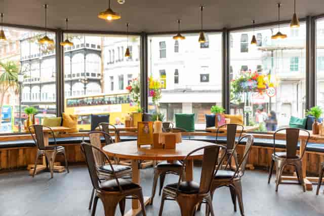 Bright meeting space with large windows for informal meetings and brainstorming in Bournemouth.