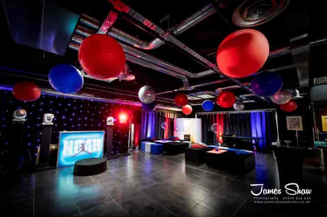 Vibrant event space with neon decor for dynamic parties and corporate functions.