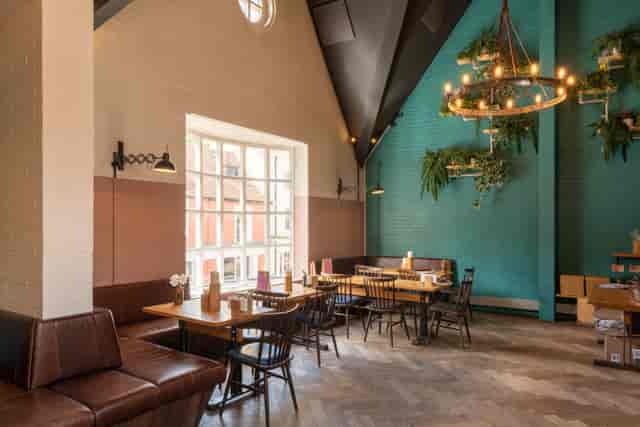 Stylish event space with high ceilings for meetings and workshops at The Cathedral Loft.