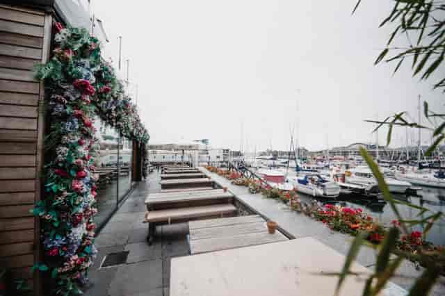 Harbour View Conservatory: rustic venue with floral decor for weddings and corporate retreats.