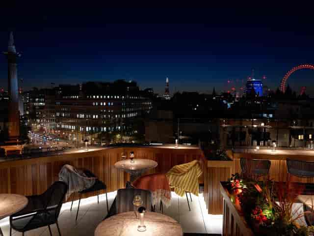 Rooftop Gallery at Trafalgar St James, elegant seating, perfect for cocktail receptions.