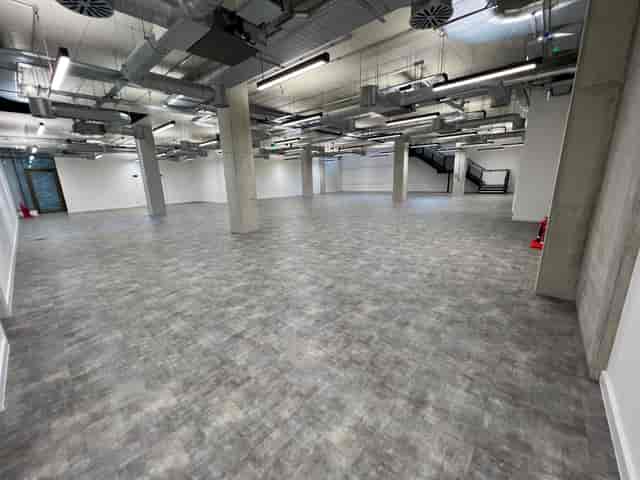 Industrial-style Lower Ground event venue at THE BLOCK with structural pillars for blank canvas.