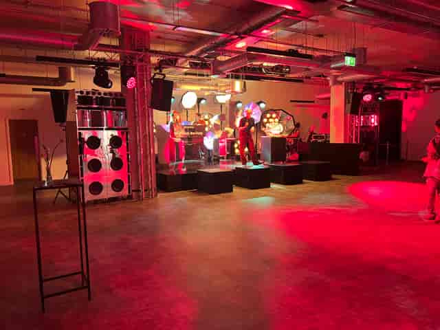 Industrial live entertainment venue at Lower Ground, THE BLOCK with modular stage and lighting.
