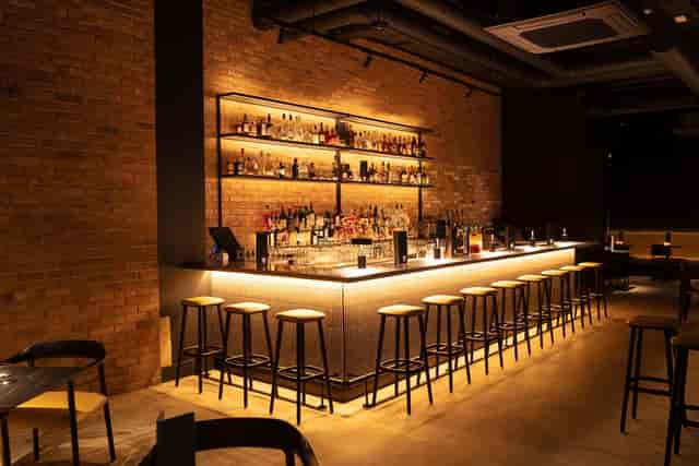 Sleek modern bar in Shoreditch, perfect for networking events and cocktail receptions.