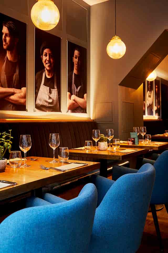 Stylish restaurant venue with warm lighting, perfect for intimate gatherings and upscale events.