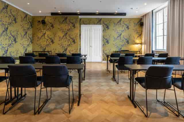 Modern meeting room at Scandic Gran Central, perfect for workshops and conferences.