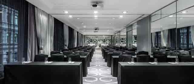 Paavo Nurmi in a stylish meeting room, ideal for corporate events and workshops.