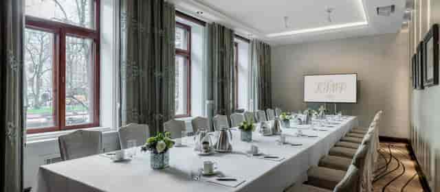 Paavo Nurmi in a stylish meeting room, perfect for corporate events and gatherings.