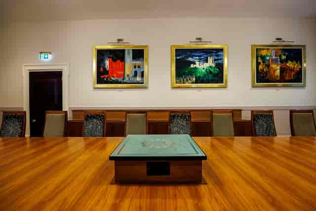 Boardroom at One Moorgate Place with polished table, ideal for meetings and strategic planning.