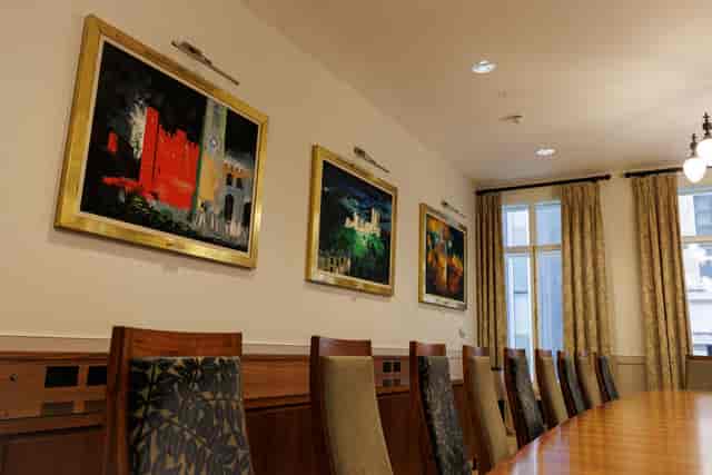 Boardroom at One Moorgate Place with wooden table, ideal for corporate meetings and events.