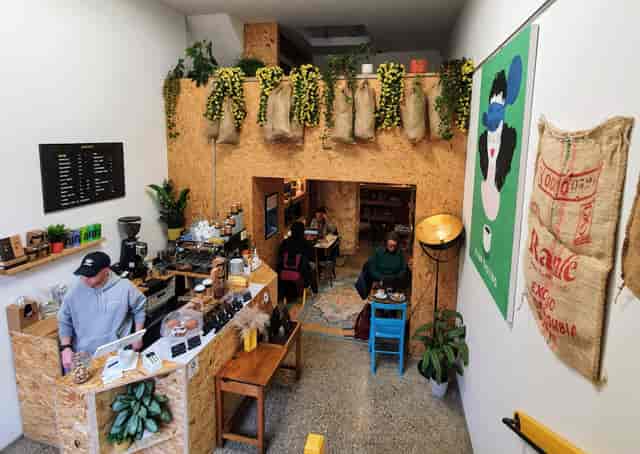 Cozy Doreen's Coffee House with wood accents, ideal for meetings and networking events.