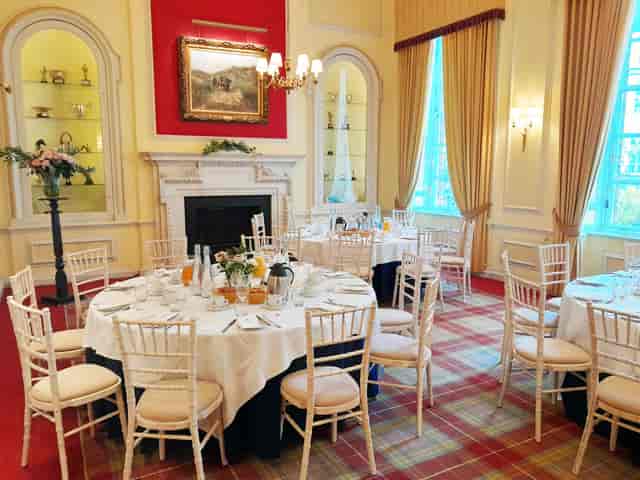 Caledonian Club breakfast event, tartan carpet, Chiavari chairs