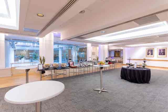 Cavendish Room event space with high-top tables, perfect for meetings and receptions.