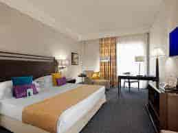 Spacious meeting room at Crowne Plaza Rome, ideal for conferences and business events.