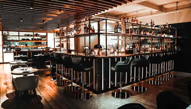 Sleek bar area in Farzi London, perfect for intimate gatherings and networking events.