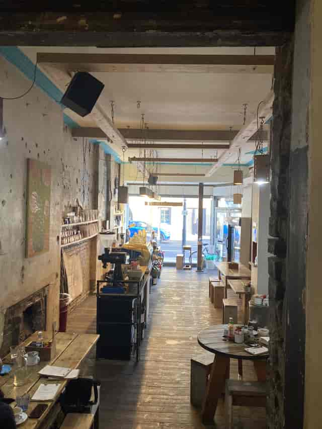 Vagabond Coffee event space with rustic charm, ideal for gatherings and workshops.