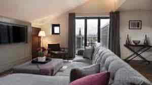 Modern lounge area with comfortable seating for networking events in Cheval Old Town Chambers.