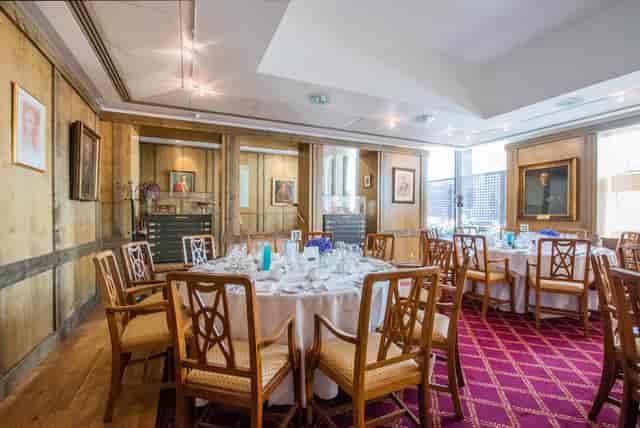 ENT Room at 1 Wimpole Street, elegant round tables for corporate meetings and private dinners.