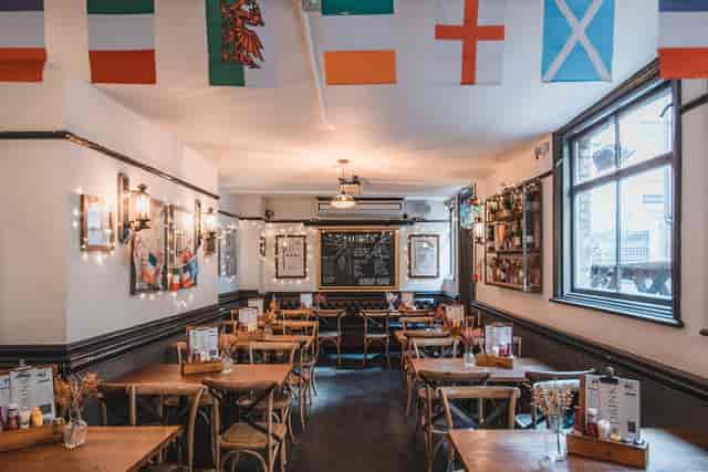 Cozy Back Restaurant Area at St Christopher's Inn, perfect for workshops and gatherings.