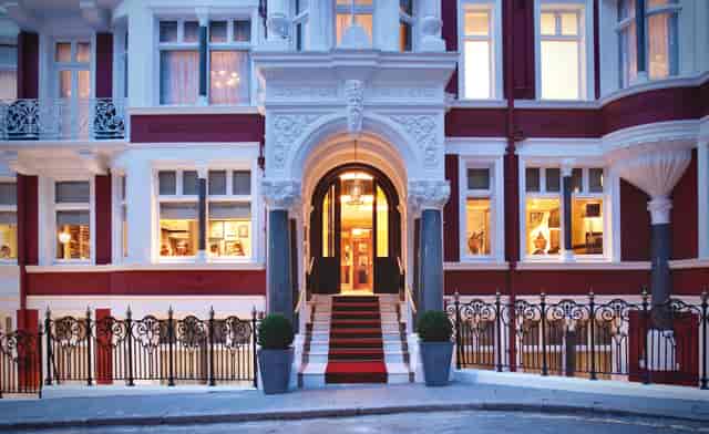 Elegant Mayfair Suite entrance in Althoff St. James's Hotel, ideal for corporate events and receptions.