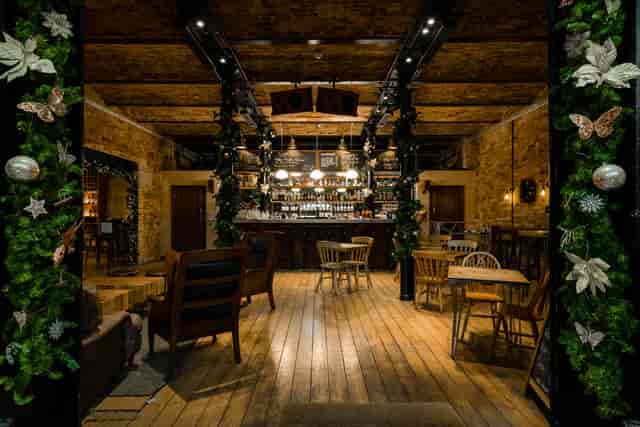 Charming dining room with rustic decor, perfect for festive gatherings and cocktail receptions.