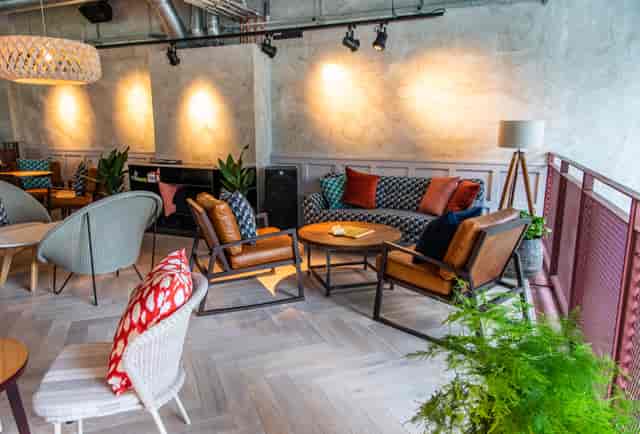 Stylish lounge area in Babel Beerhouse, perfect for networking events and meetings.