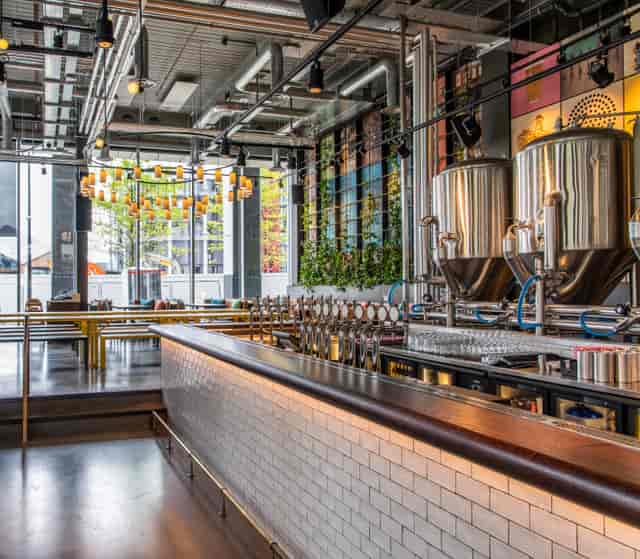 Modern bar setup at Babel Beerhouse, ideal for events and craft beer tastings.