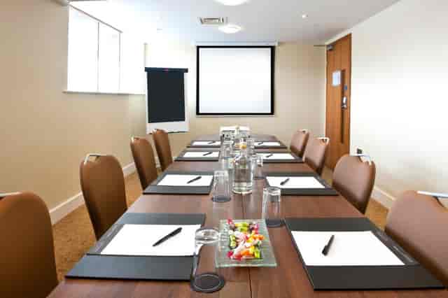 Meeting room setup at Voco St David's Cardiff for professional gatherings and presentations.